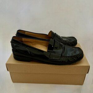 Black patent leather penny loafers